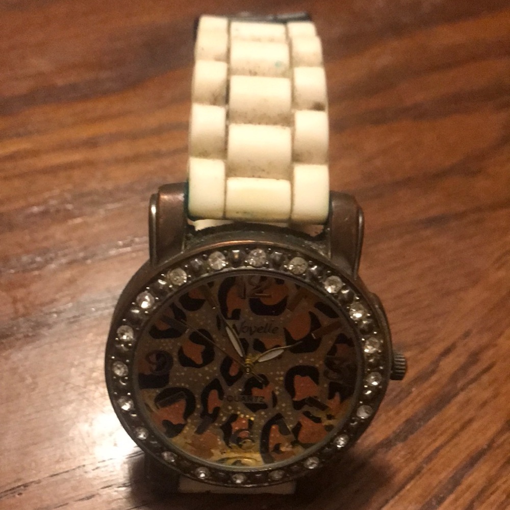 Cheetah watch with cream colored band